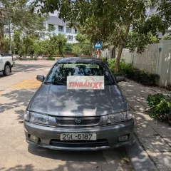 Mazda 323 màu Xám
