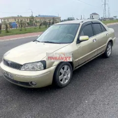 Ford Laser Vàng cát Số sàn