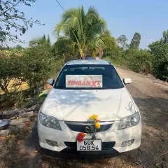 Mazda 323 2003 Trắng số sàn