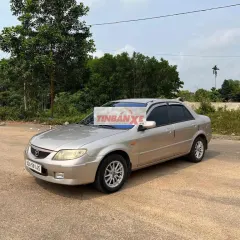 Mazda 323 2003 1.6L Vàng cát