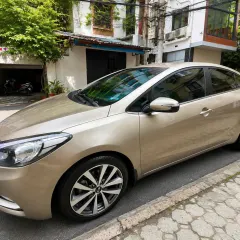 Chính chủ Cần bán xe kia k3 AT 1.6 màu vàng cát