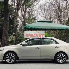 Kia Forte 2010 Tự động 180000 km Vàng cát