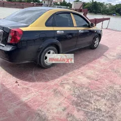 Chevrolet Lacetti Đen, vàng 5 chỗ