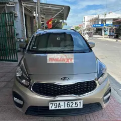 Kia Rondo 7 chỗ MT Vàng cát 7.2v km