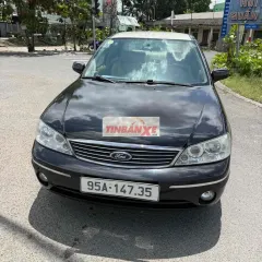Ford Laser 2004 Đen 5 chỗ