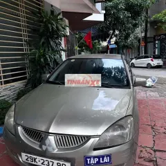 Mitsubishi Lancer 2004 Vàng cát Xe tập lái