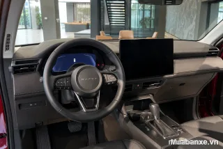 Nội thất Mazda CX-5 cao cấp với vô lăng hiện đại và màn hình giải trí lớn.
