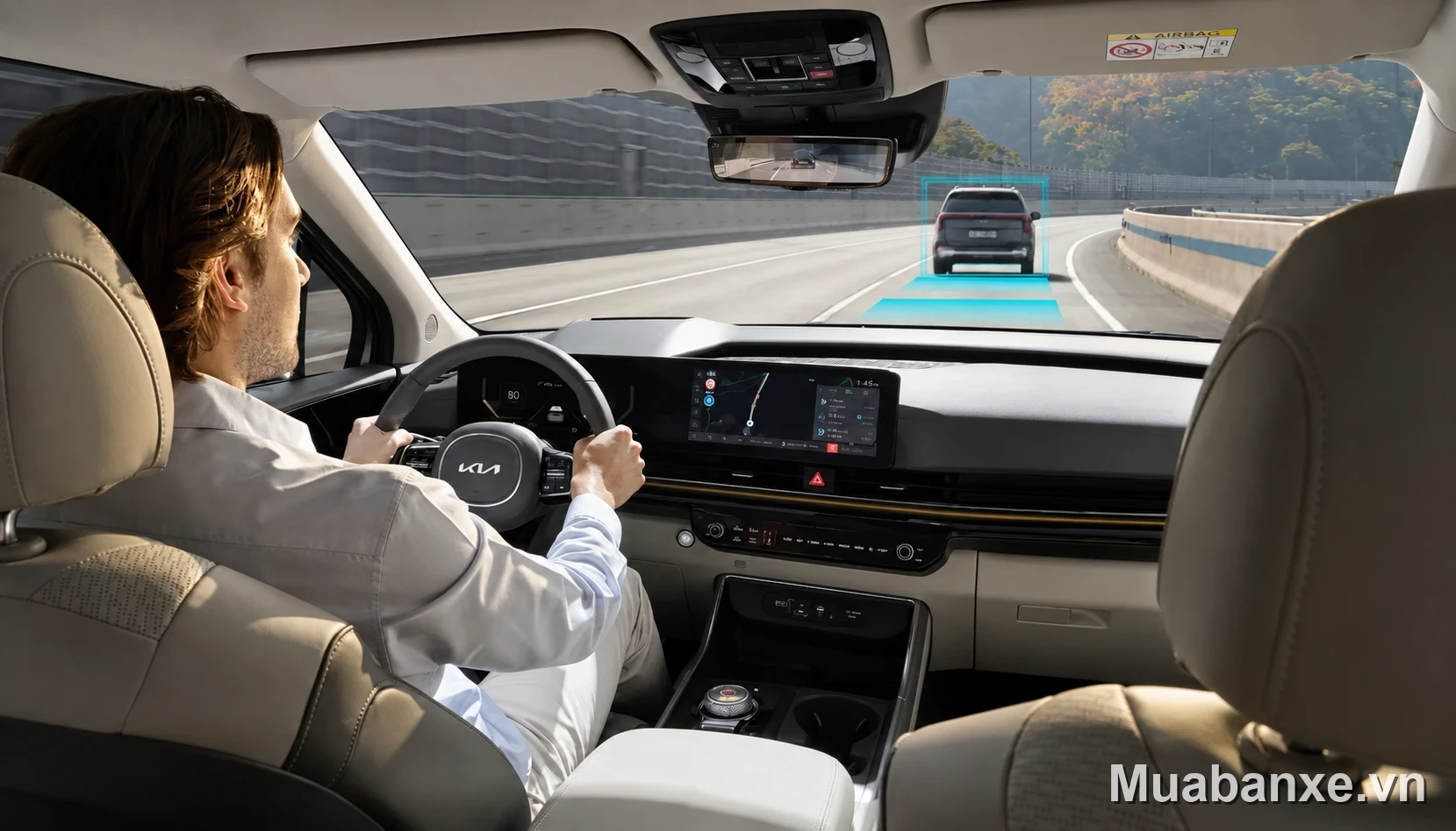 Kia Carnival khoang lái với vô lăng và màn hình điều khiển