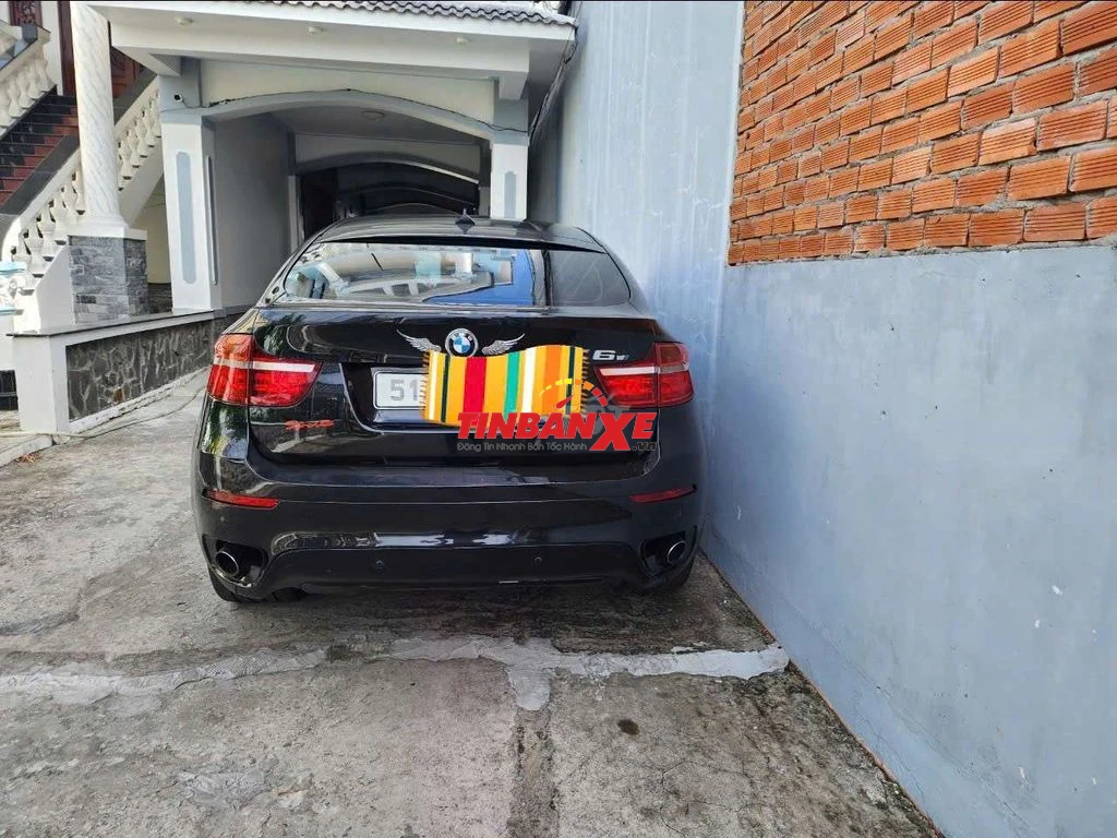 Bán 1 xe 2012 đen tặng 1 xe X6 màu trắng sx 2008