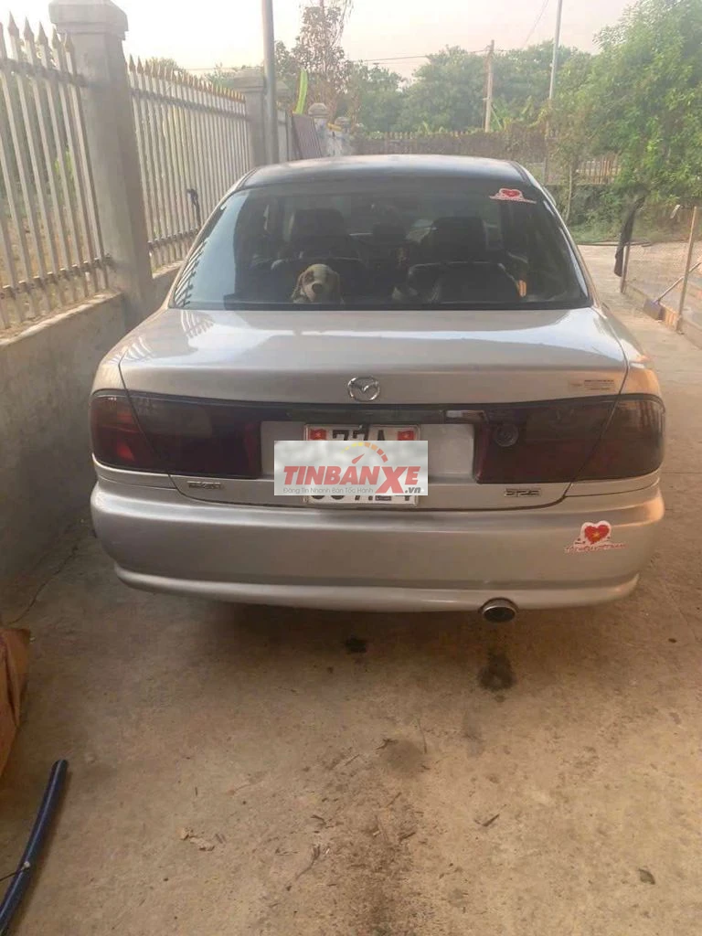Mazda 323 Bạc số sàn