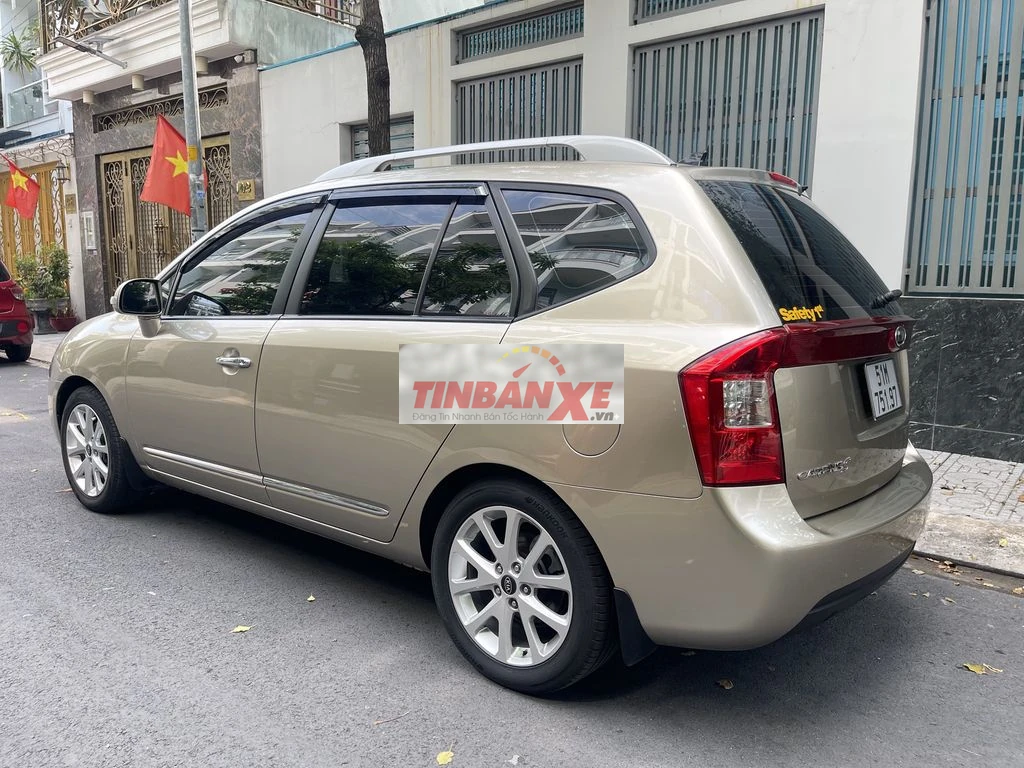 Kia 7 chỗ Carens S 2014 Vàng Gold cửa nóc