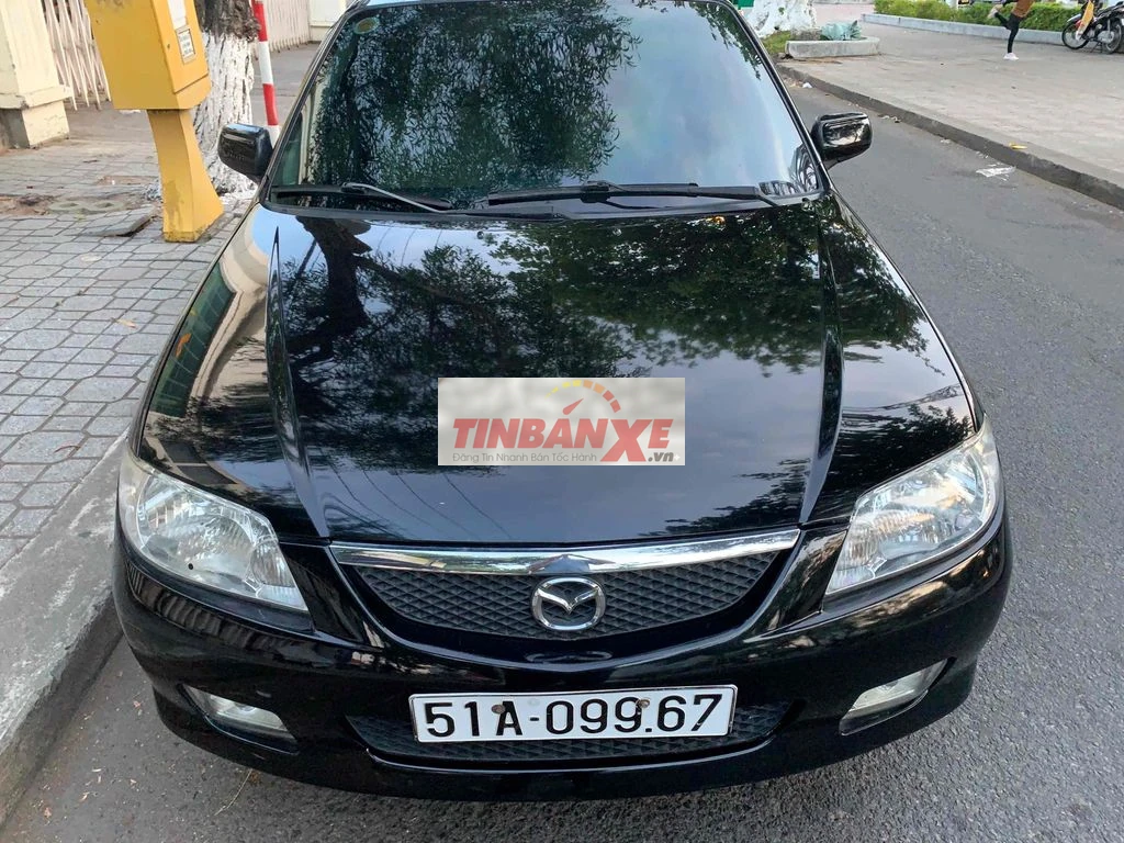 Mazda 323-2003 xe gia đình