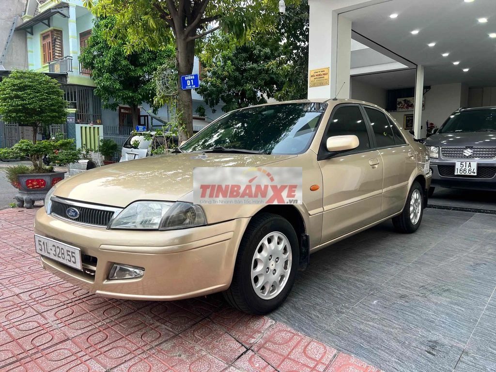 Ford Laser Deluxe 2002 Vàng cát đẹp xuất sắc.