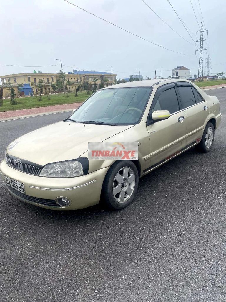 Ford Laser Vàng cát Số sàn
