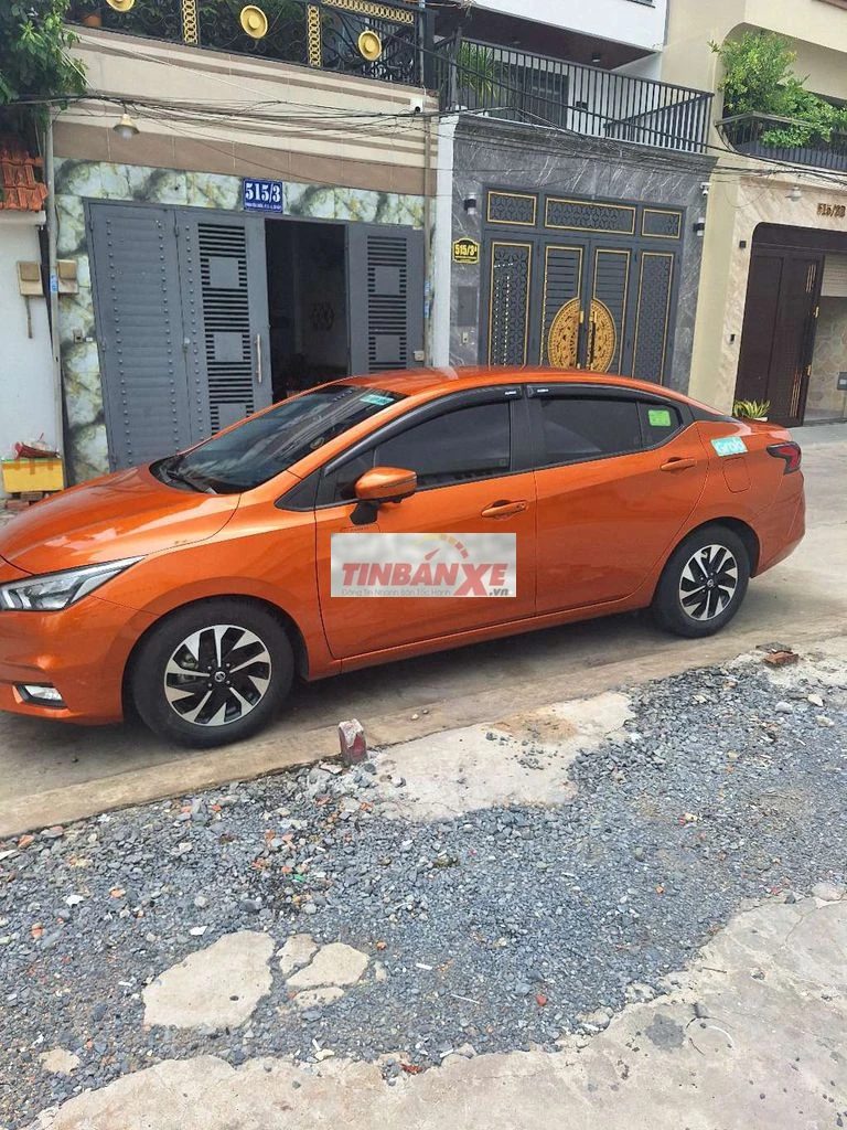 Nissan Almera màu Cam