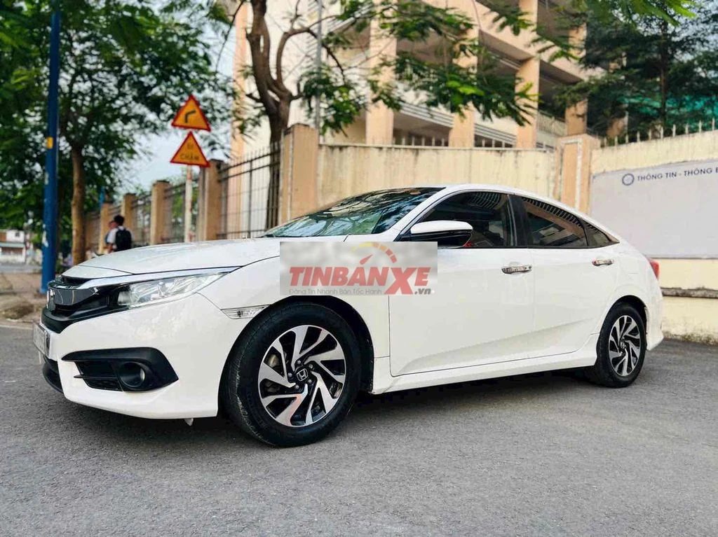 Honda Civic 1.8E 2018 Trắng . odo 86k km . zin