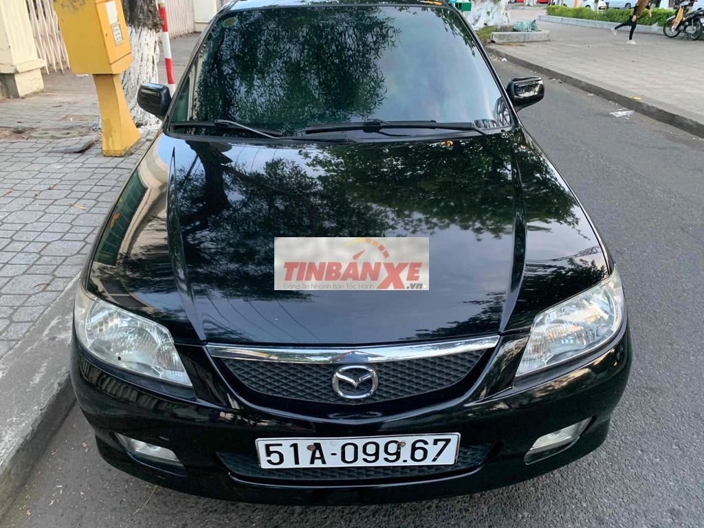 Mazda 323-2003 xe gia đình