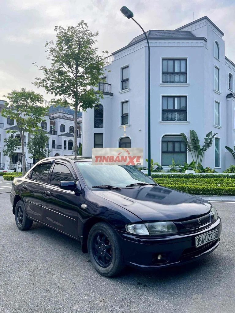 Mazda 323 Đen