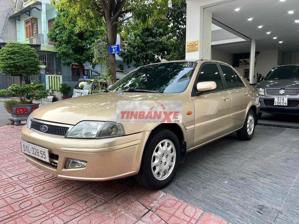 Ford Laser Deluxe 1.6 Vàng cát