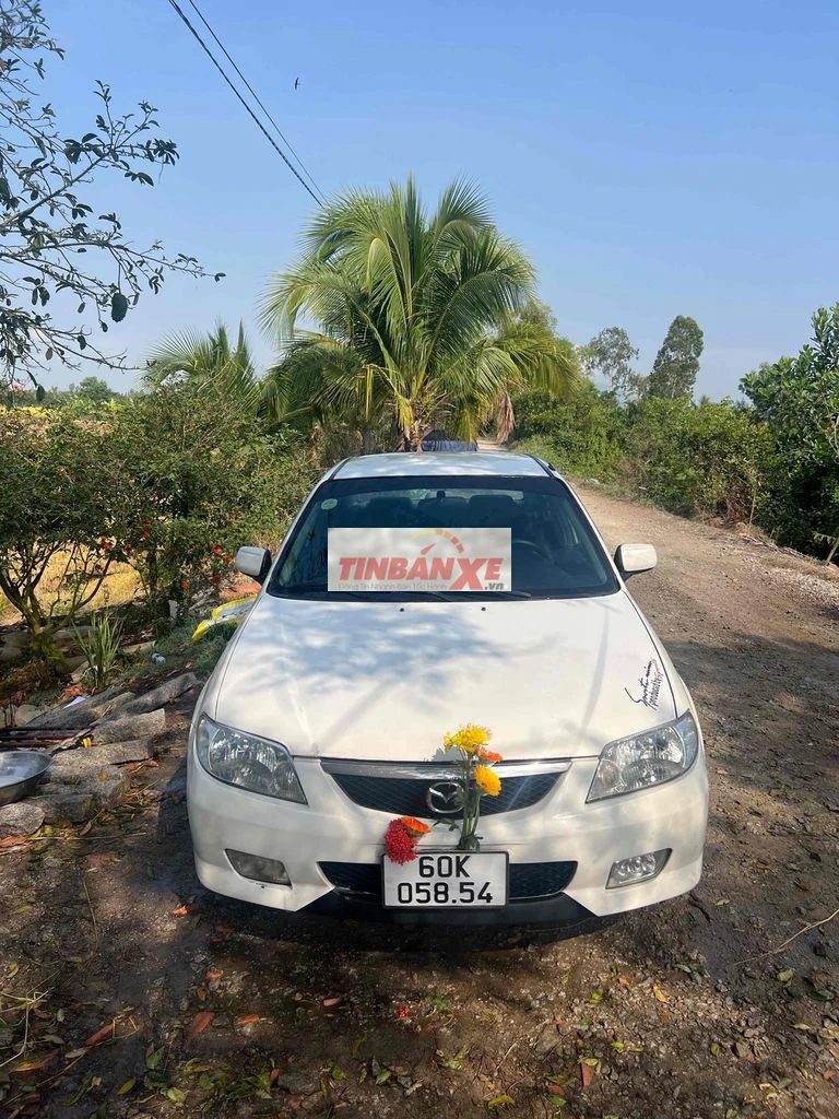 Mazda 323 2003 Trắng số sàn