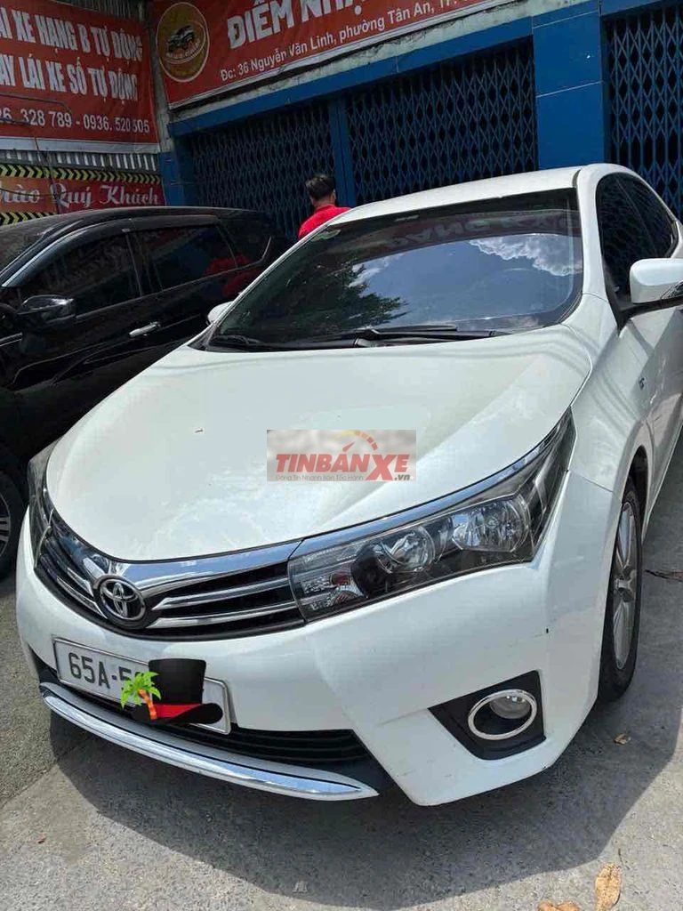 Toyota 2014 1.8G Trắng