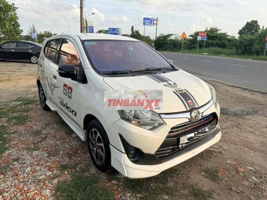 Toyota Wigo 2024 Trắng Tự động 5 chỗ
