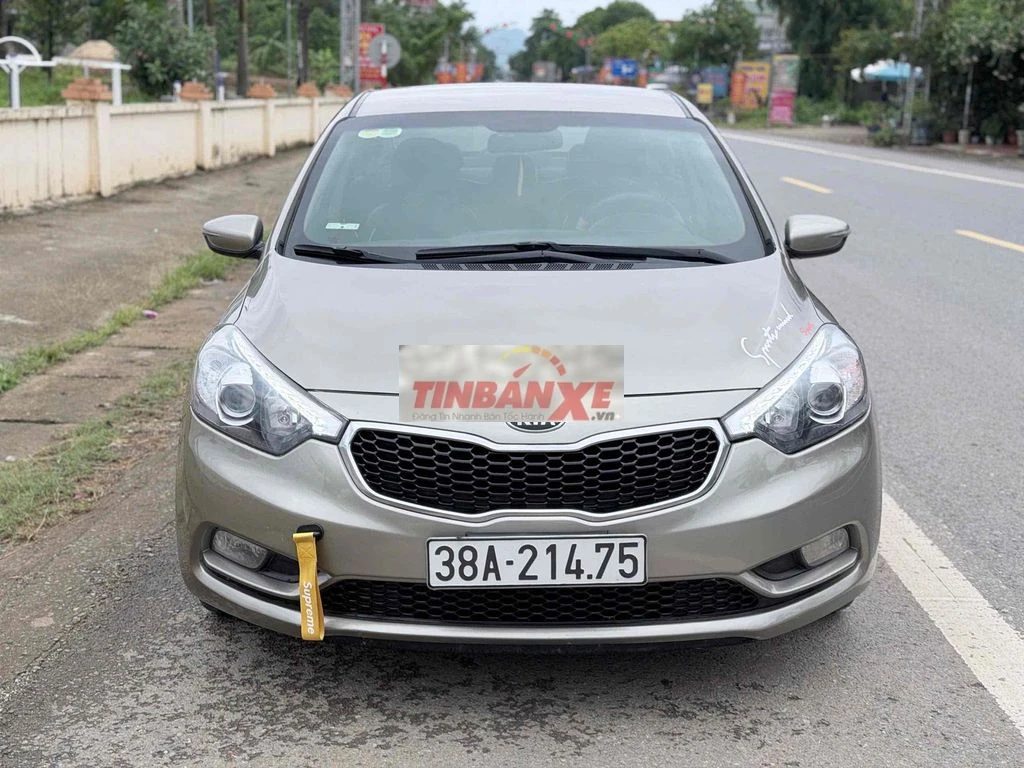 Kia K3 2015 Số sàn Vàng cát 5 chỗ