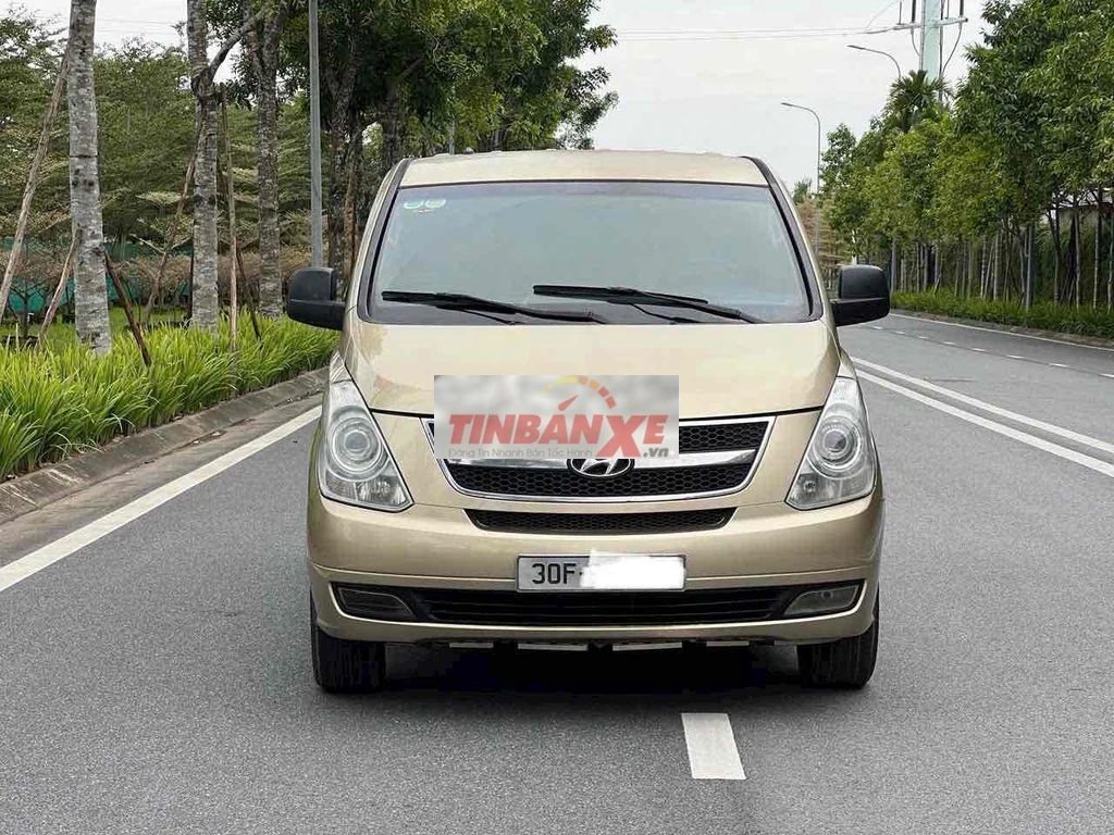 Hyundai Starex 9 chỗ Vàng cát 2010