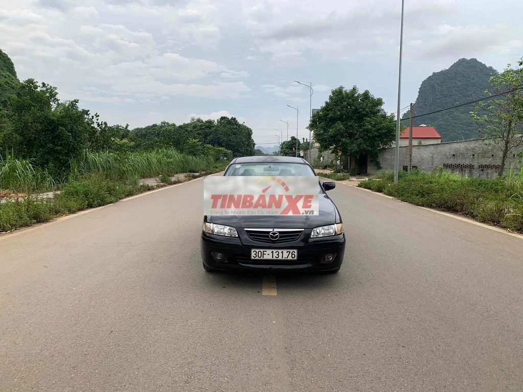 Mazda 626 Số sàn Xăng màu Đen