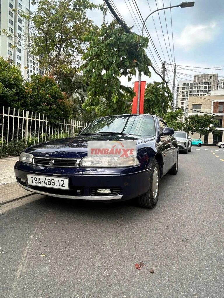 Cần bán Mazda 626 đời 1995, màu xanh đậm
