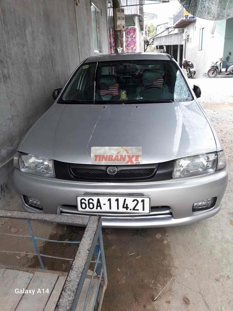 Mazda 323 2000 Xám bạc