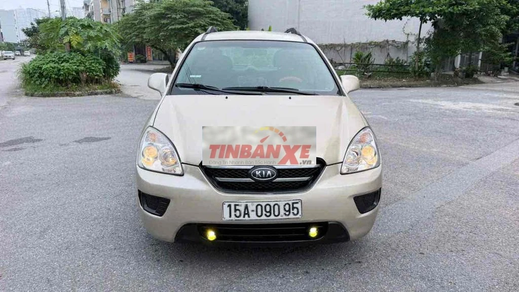 Kia Caren 2009 Số sàn Vàng cát