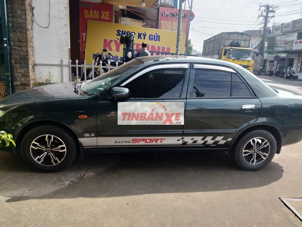 Cần bán xe Mazda 323 cũ đời 2002